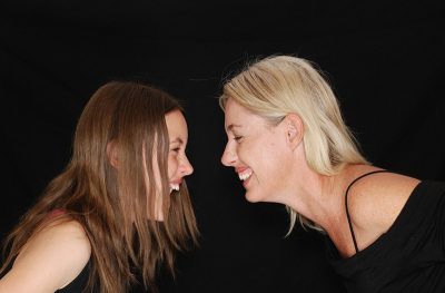 woman and girl laughing